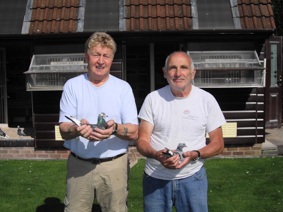 John Winstanley holding the breeders exchange winner and Geff holding 3rd prize winner in the LSC raceJPG