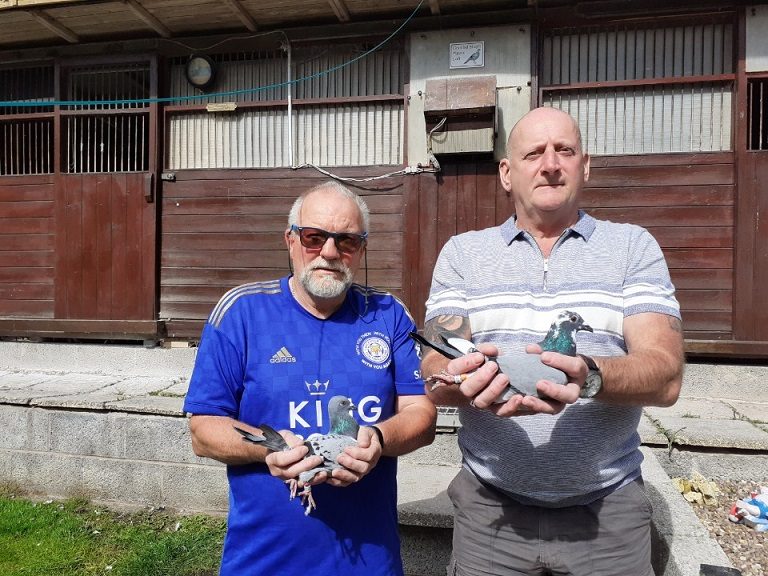 Team Shepherd holding their gold ring birds 11 09 20