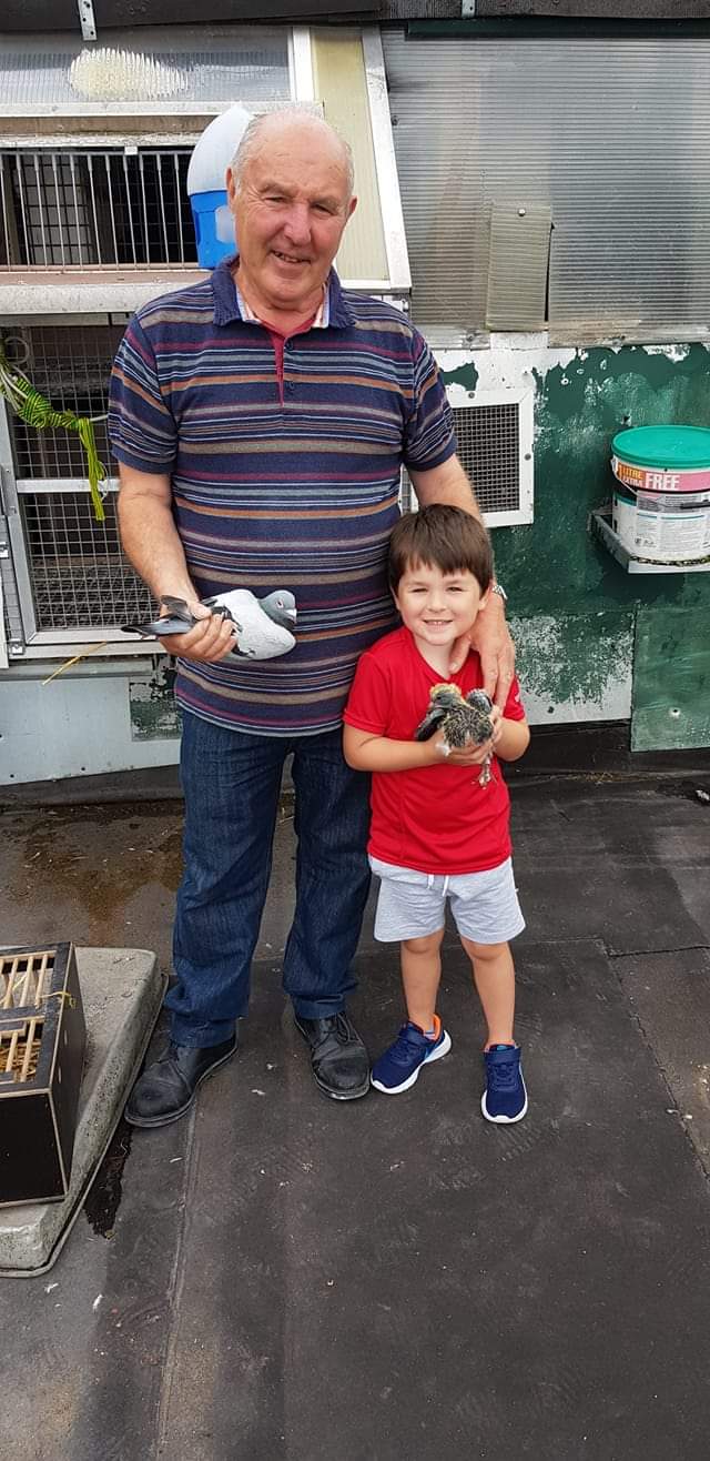 Tom Cahill holding Charlie Dylan his 2020 St