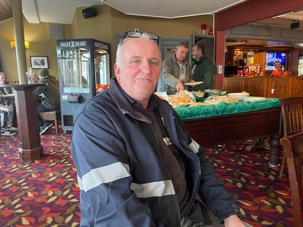 Alan Bettney with the hot and cold Buffet behind him. 04 02 22