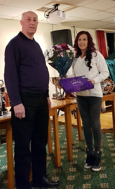 Alan Peach presenting Alys with a bunch of flowers and a box of chocolates. 12 02 24z