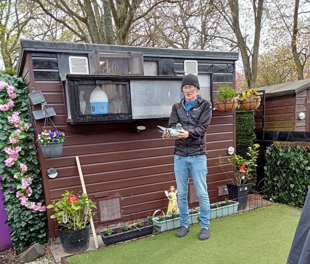 Paul Cameron holding his winner outside his small loft 08 05 24x