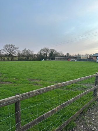 the enclosed field at the house 27 01 25a