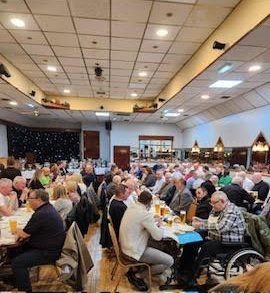 Everyone seated for meal 10 03 25a