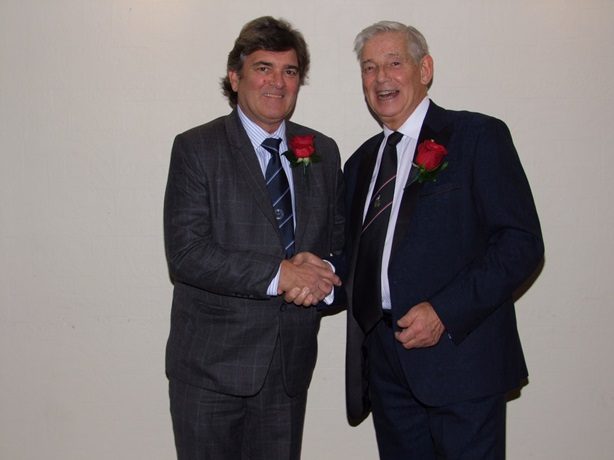 New Member Paul Dalton congratulated by Secretary Brian Dearn 25 11 25A