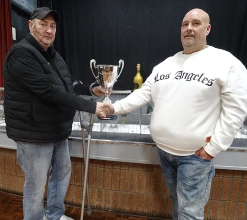 Garry Fletcher left presenting Mick Willis with the Champion of Champions trophy. 03 01 26b
