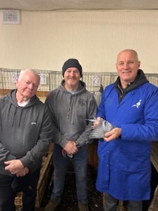 Tom CorrieR jnr with judges Stuart LammieL Andy Graham C 13 01 26a